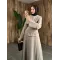 طقم تنورة وقميص مخصّر - بيج
