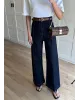 High-Waisted Dark Blue Ribbed Jeans with Tan Belt