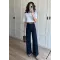 High-Waisted Dark Blue Ribbed Jeans with Tan Belt