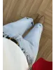 Ice Blue Cuffed Jeans with Black Belt