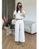 Ecru Cuffed Jeans with Brown Belt